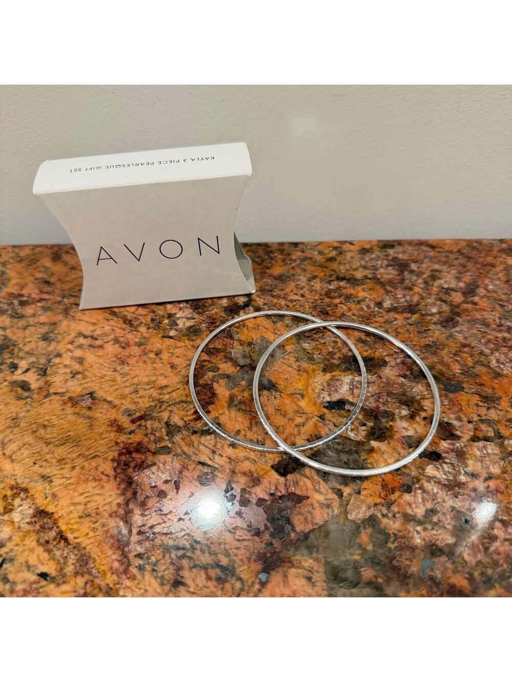 Avon Silver Toned Bangled Bracelets